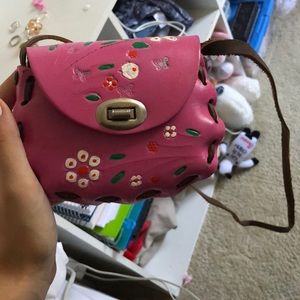 small pink leather purse